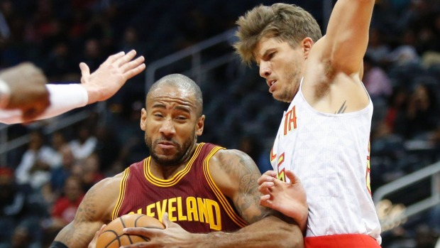 Kyle Korver right will swap his Atlanta Hawks uniform for a Cavaliers one