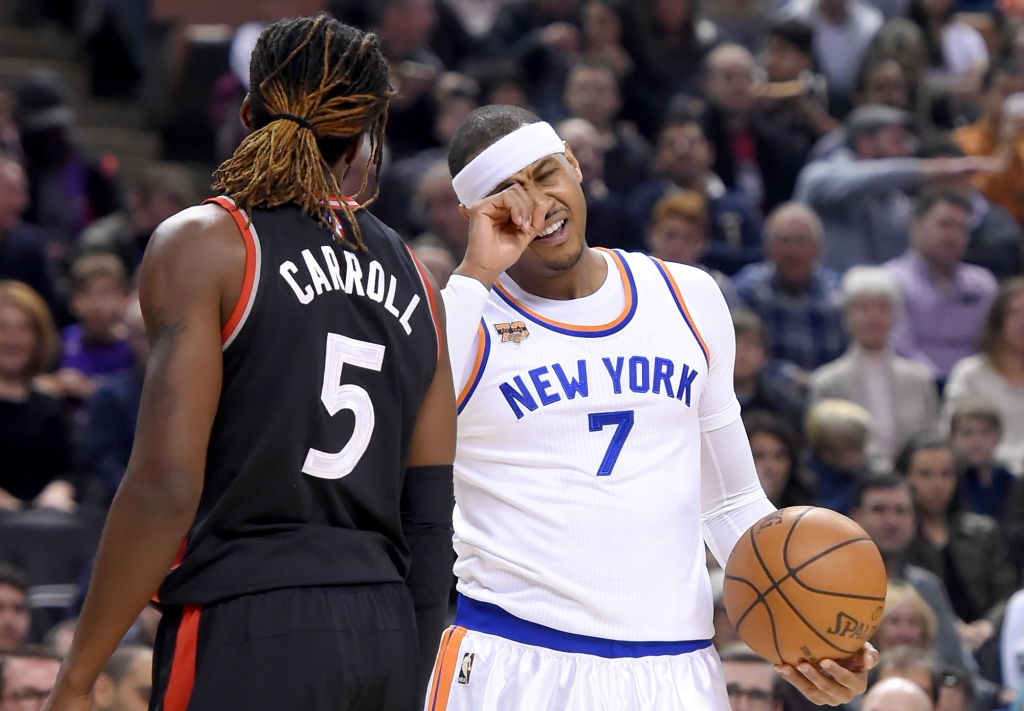 Jan 15 2017 Toronto Ontario CAN New York Knicks forward Carmelo Anthony reacts after being poked in the eye by Toronto Raptors forward De Marre Carroll in the first quarter at Air Canada Centre. Mandatory Credit Dan Hamilton-USA TODAY Sports