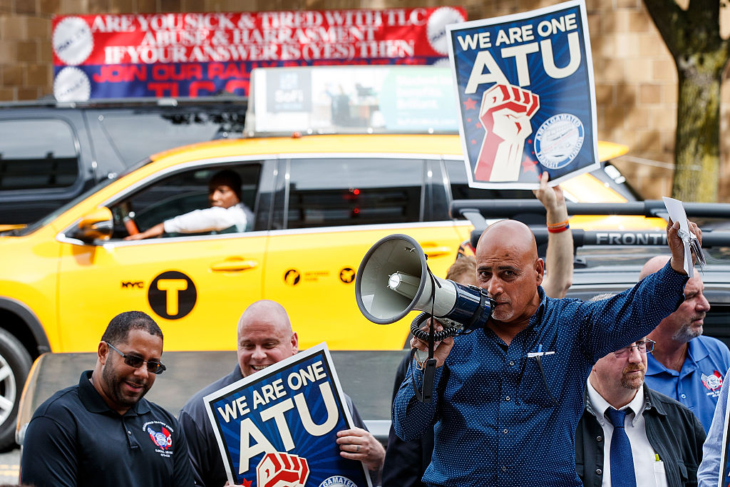 Uber CEO offers compensation for drivers impacted by immigration ban, will talk to Trump