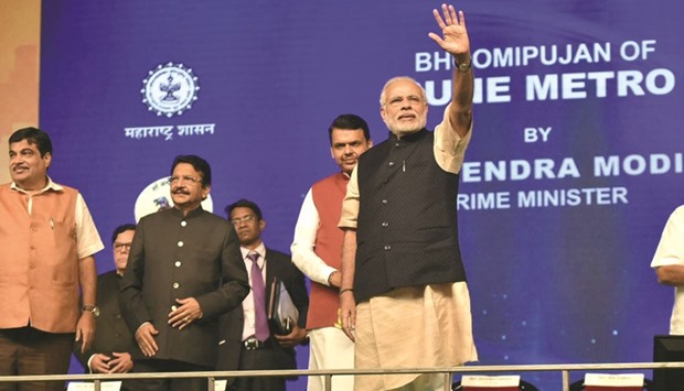 Prime Minister Narendra Modi waves to supporters at an event in Pune. Modi is a master at channellin