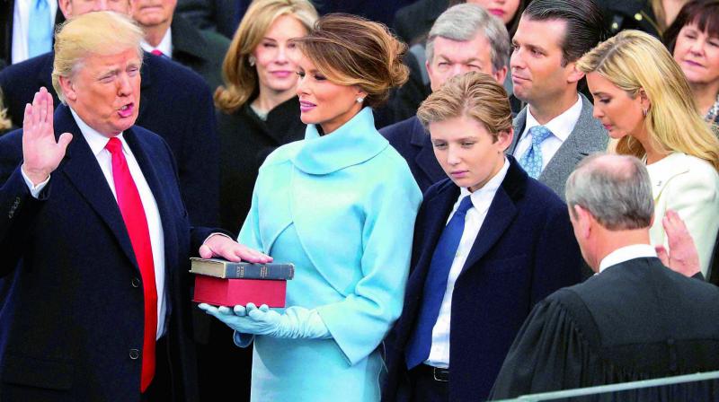 Donald Trump with Melania at the inauguration ceremony on Friday