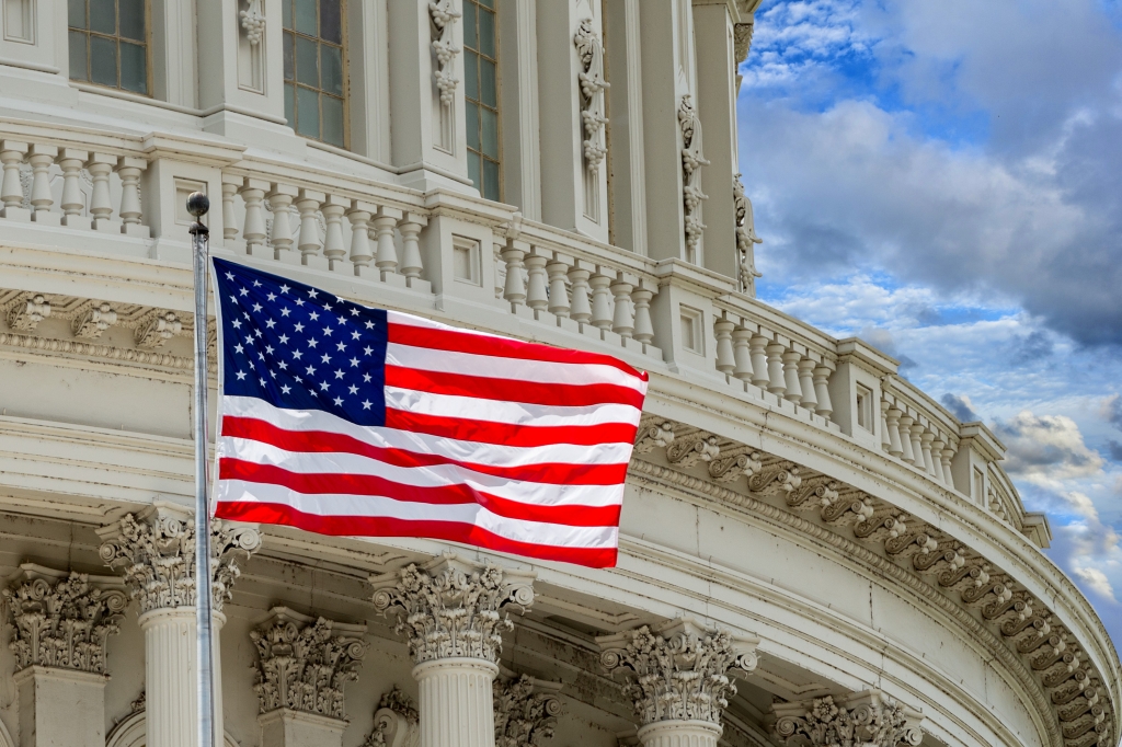 U.S. Capitol with flag