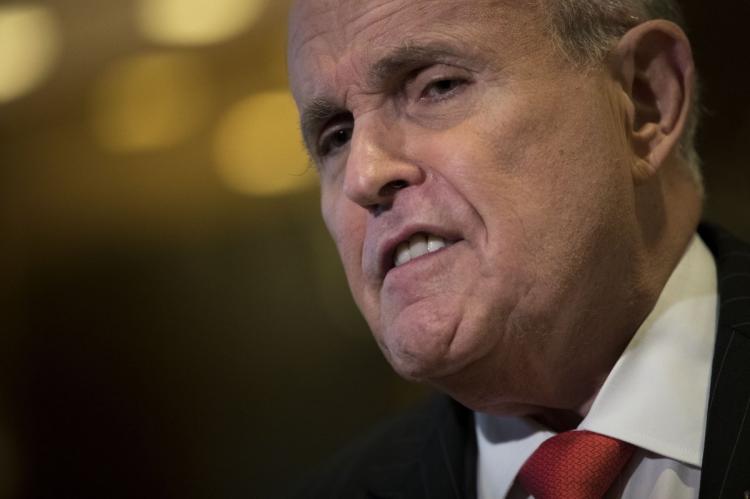 Former New York City Mayor Rudy Giuliani identified himself as one of the creators of a travel ban implemented on Friday