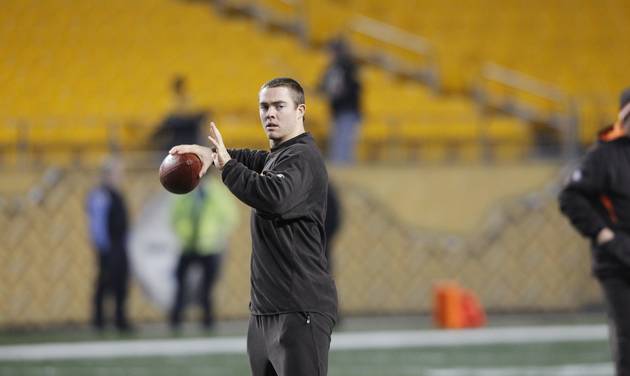 Cleveland Browns quarterback Colt Mc Coy passes while he warms up before the NFL football game between the Pittsburgh Steelers and the Cleveland Browns on Thursday Dec. 8 2011 in Pittsburgh