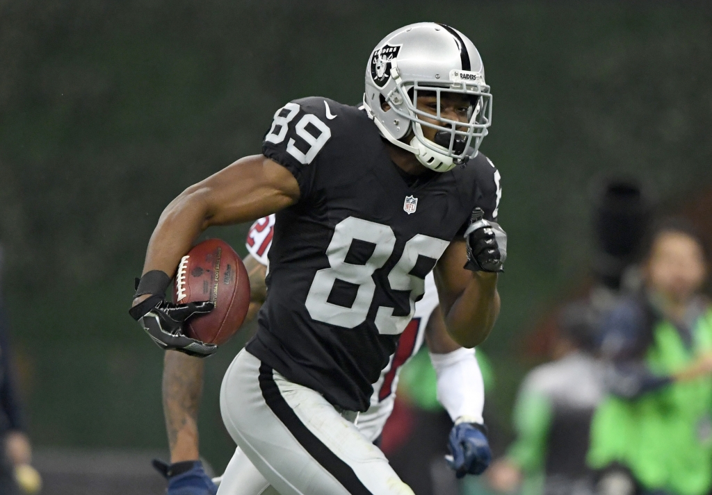 Nov 21 2016 Mexico City MEX Oakland Raiders wide receiver Amari Cooper scores on a 35-yard touchdown reception in the fourth quarter against the Houston Texans during a NFL International Series game at Estadio Azteca. The Raiders defeated the Tex