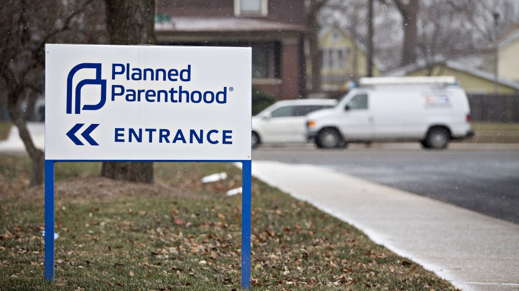 Signage is displayed outside a Planned Parenthood office in Peoria Illinois U.S. on Friday Dec. 16 2016