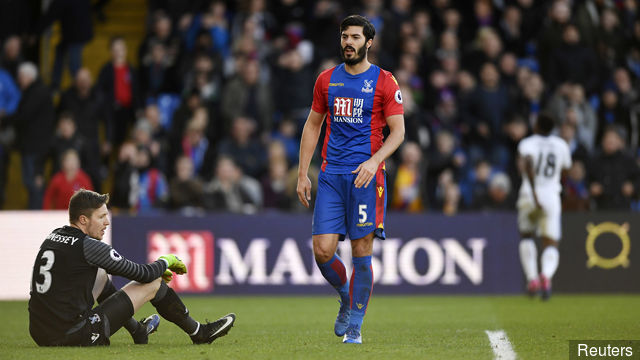 Crystal Palace's James Tomkins and Wayne Hennessey looks dejected after the third goal