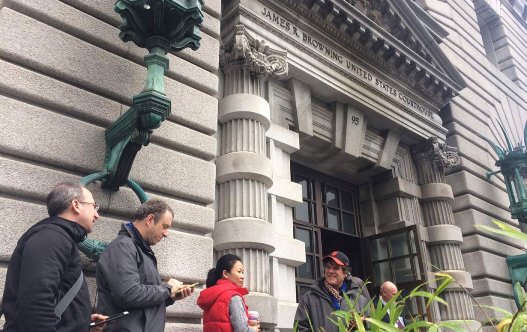 Members of the media line outside the 9th U.S. Circuit Court of Appeals building in San Francisco on Thursday Feb. 9 2017