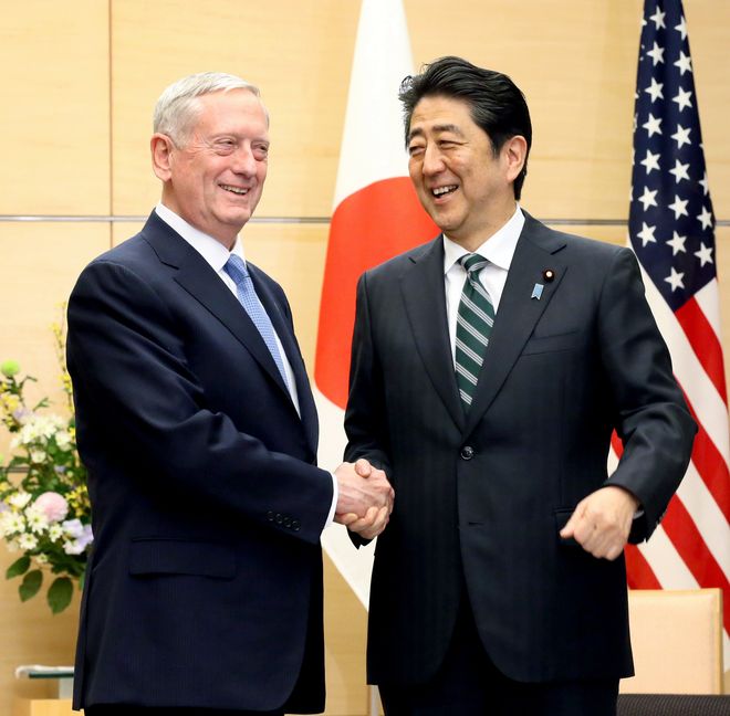 Prime Minister Shinzo Abe right meets with U.S. Defense Secretary James Mattis in Tokyo on Feb. 3