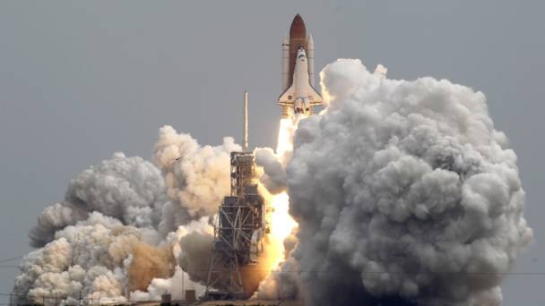 Space shuttle Atlantis lifting off from Pad 39A at the Kennedy Space Center in 2011