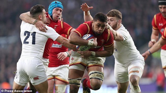 Taulupe Faletau charges through the England defence