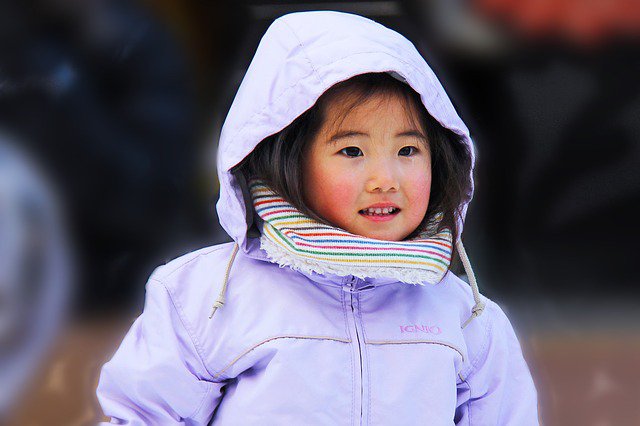 A Japanese pupil participating in an evacuation drill