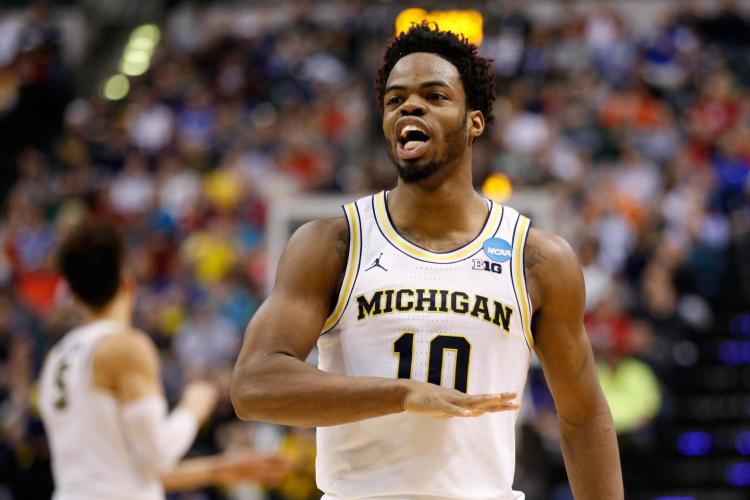 Derrick Walton Jr. and Michigan hope to keep their run going into the Elite Eight