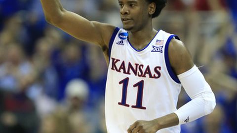 Kansas guard Josh Jackson celebrates after making a 3-point basket during the first half against Purdue in a regional semifinal of the NCAA men's college basketball tournament Thursday