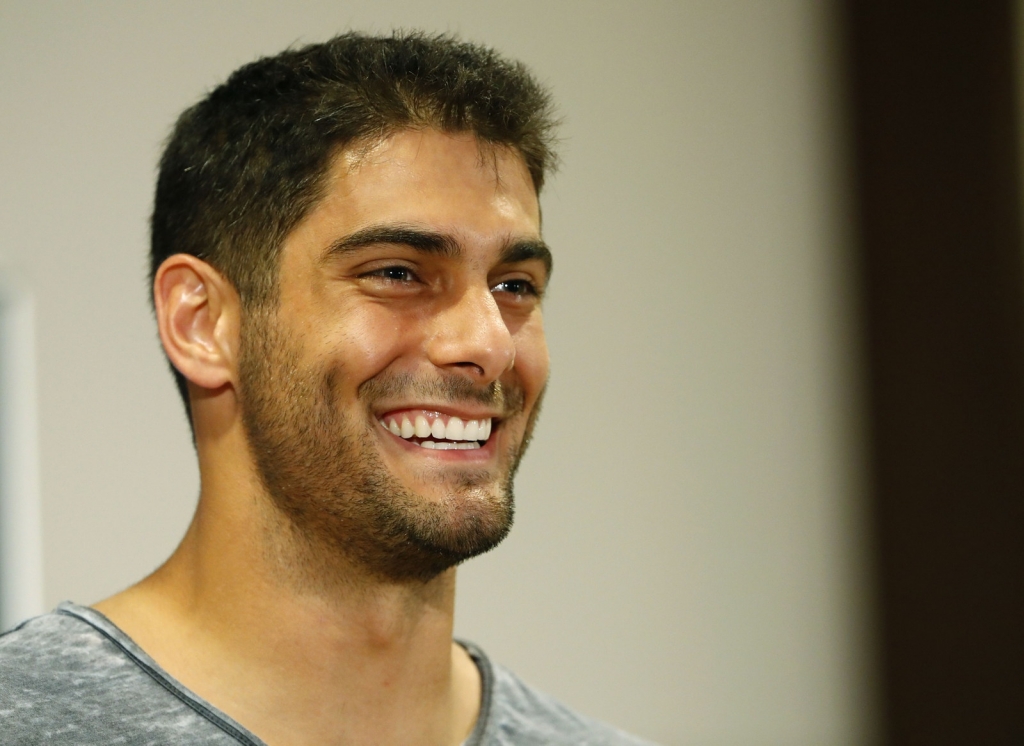 AP Jimmy Garoppolo smiles after game