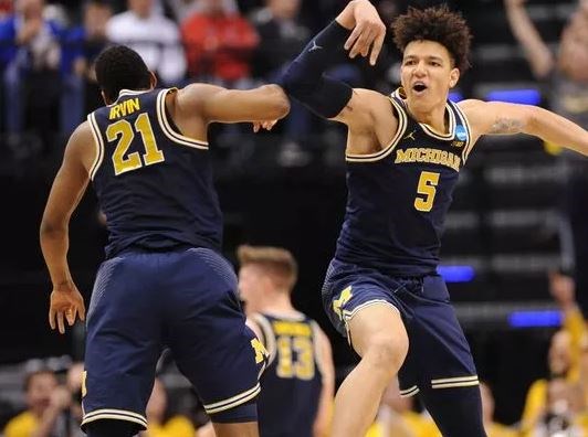 Big Ten upsets put the 'Madness' in March Madness, and fans eat it up