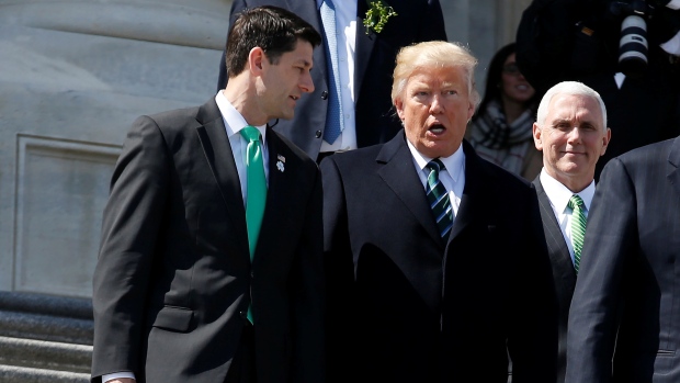 Speaker of the House Paul Ryan, U.S. President Donald Trump and U.S. Vice President Mike Pence walk after attending a Friends of Ireland reception on Capitol Hill in Washington U.S