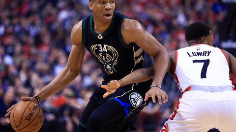 TORONTO ON- APRIL 15 Giannis Antetokounmpo #34 of the Milwaukee Bucks dribbles the ball as Kyle Lowry #7 of the Toronto Raptors defends in the first half of Game One of the Eastern Conference Quarterfinals during the 2017 NBA Playoffs at Air Canada Ce