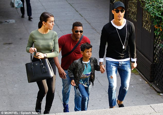 Family outing The three-piece were seen in Ronaldo's native Spain for the afternoon