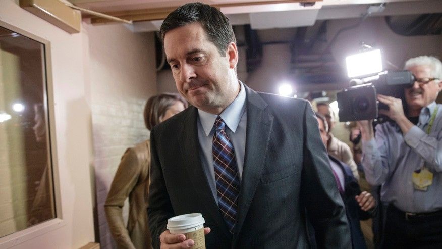 House Intelligence Committee Chairman Rep. Devin Nunes R-Calif. is pursued by reporters as he arrives for a weekly meeting of the Republican Conference with House Speaker Paul Ryan and the GOP leadership Tuesday