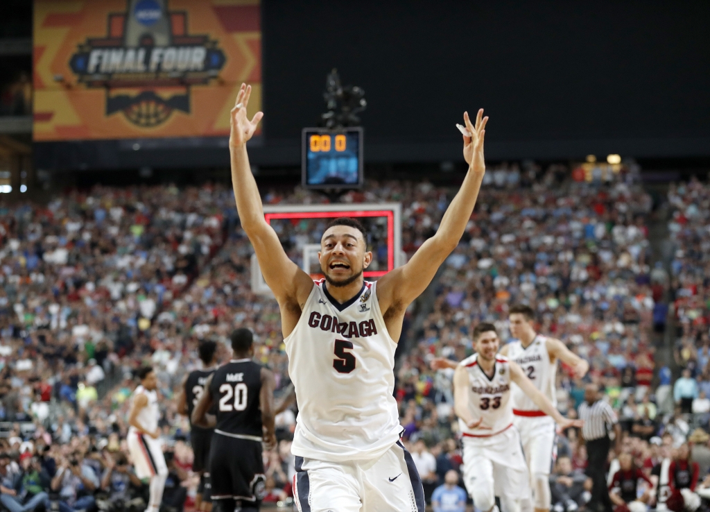 Gonzaga's Nigel Williams Goss celebrates his team's win at Saturday night's buzzer for the NCAA semifinals game against South Carolina