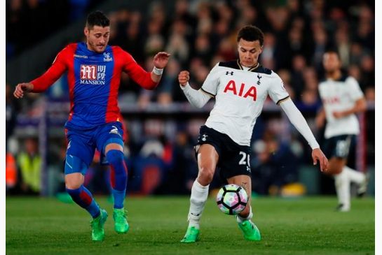 Tottenham's Dele Alli right with Crystal Palace's Joel Ward during the English Premier League soccer match between Crystal Palace and Tottenham Hotspur at Selhurst Park stadium in London Wednesday