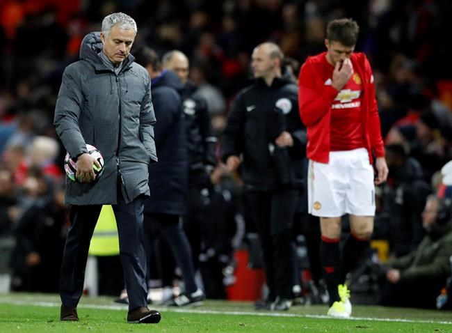 Manchester United manager Jose Mourinho leaves the pitch after the English Premier League soccer match between Manchester United and Everton at Old Trafford in Manchester England Tuesday