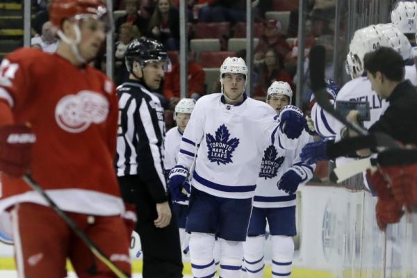 Toronto Maple Leafs center Auston Matthews greets teammates