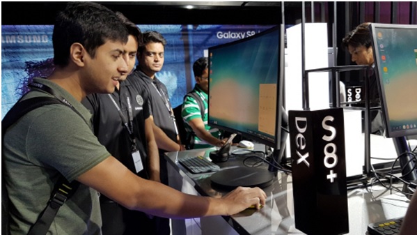 Visitors experience Samsung DeX which allows to use the Galaxy S8 and Galaxy S8 Plus as a desktop computer at the Galaxy S8 and Galaxy S8 Plus media event held in New Delhi India on April 19