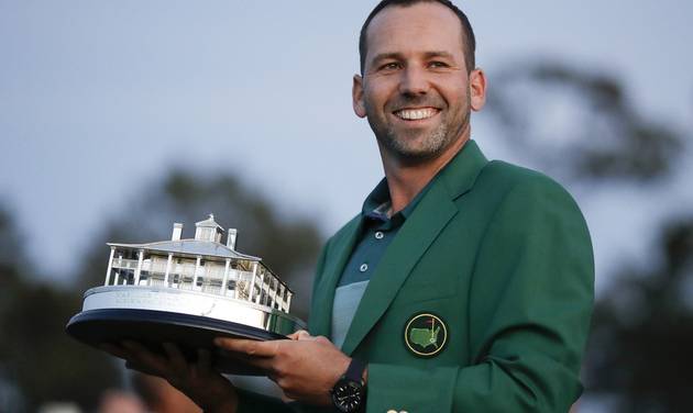 Sergio Garcia of Spain holds his trophy at the green jacket ceremony after the Masters golf tournament Sunday