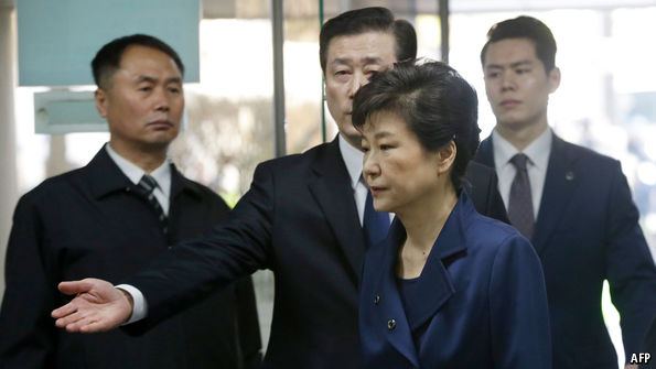 From Blue House to jailhouseSouth Korea's ex-president is arrested on charges of bribery and abuse of power