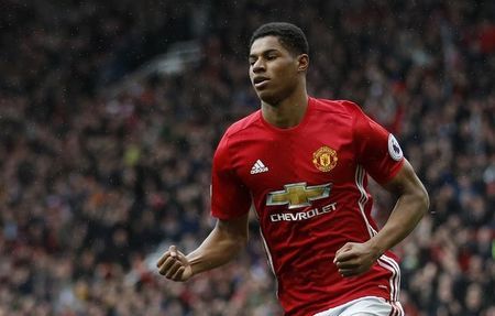 Manchester United's Marcus Rashford celebrates scoring their first goal