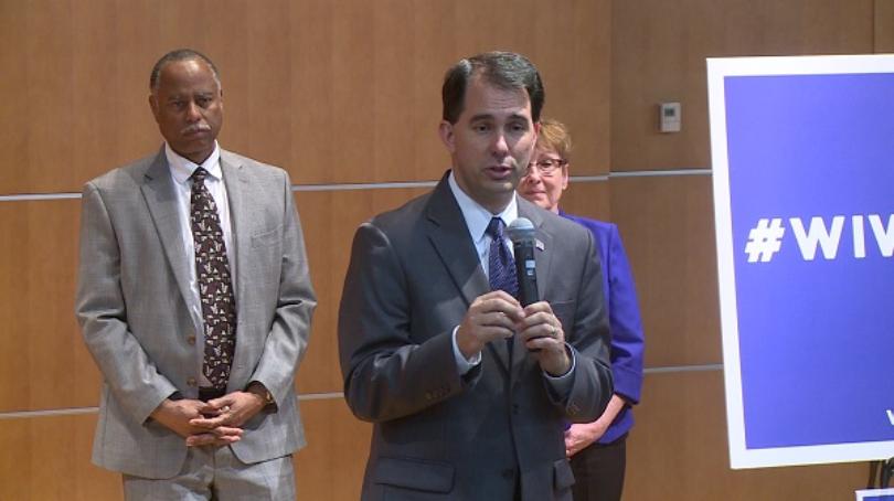 Wisconsin Gov. Scott Walker gives remarks during a stop at Mayo Clinic Health System in Eau Claire on Monday