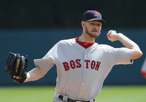 Boston Red Sox pitcher Chris Sale throws a warmup pitch against the Detroit Tigers in the first inning of a baseball game in Detroit Monday