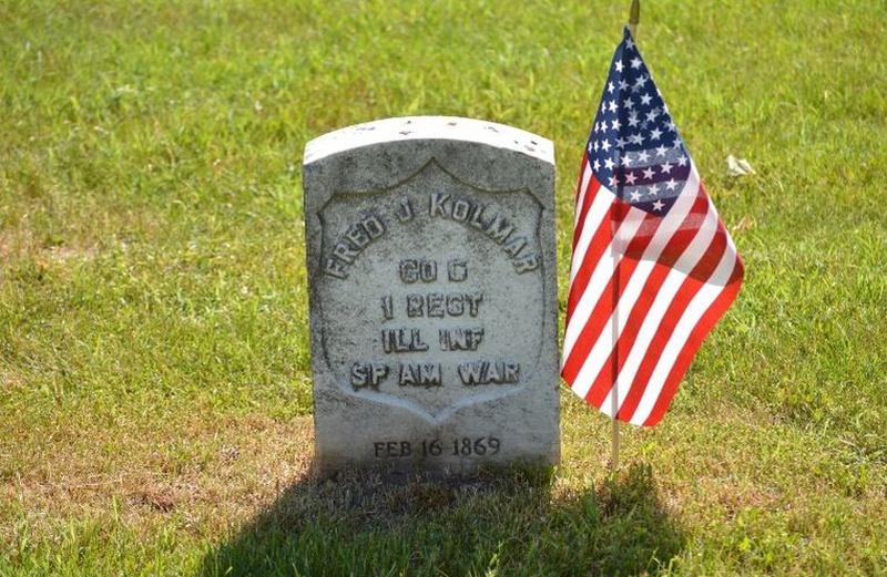 American flag at grave on Memorial Day