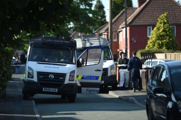 Police activity at a Manchester home in connection