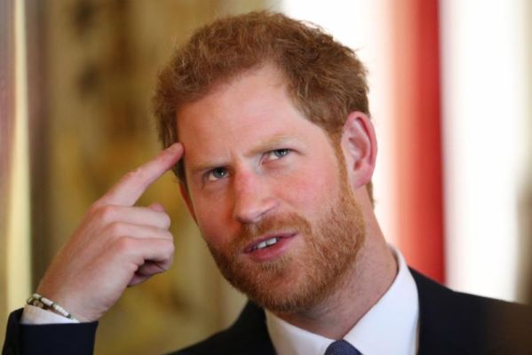 Britain's Prince Harry gestures as he hosts