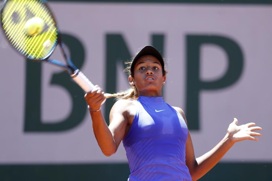 Whitney Osuigwe of the United States returns the ball to compatriot Claire Liu during the girls final of the French Open tennis tournament at the Roland Garros stadium Saturday