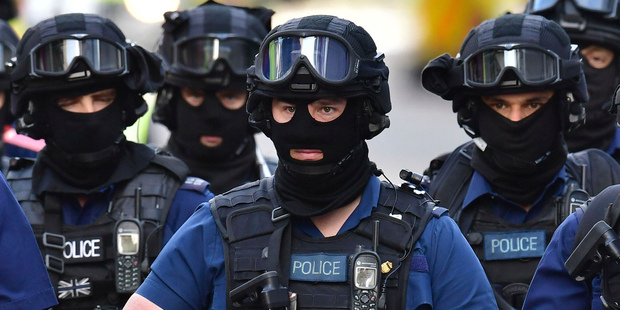 Loading Armed police on St Thomas Street London near the scene of Saturday night's terrorist incident on London Bridge and at Borough Market