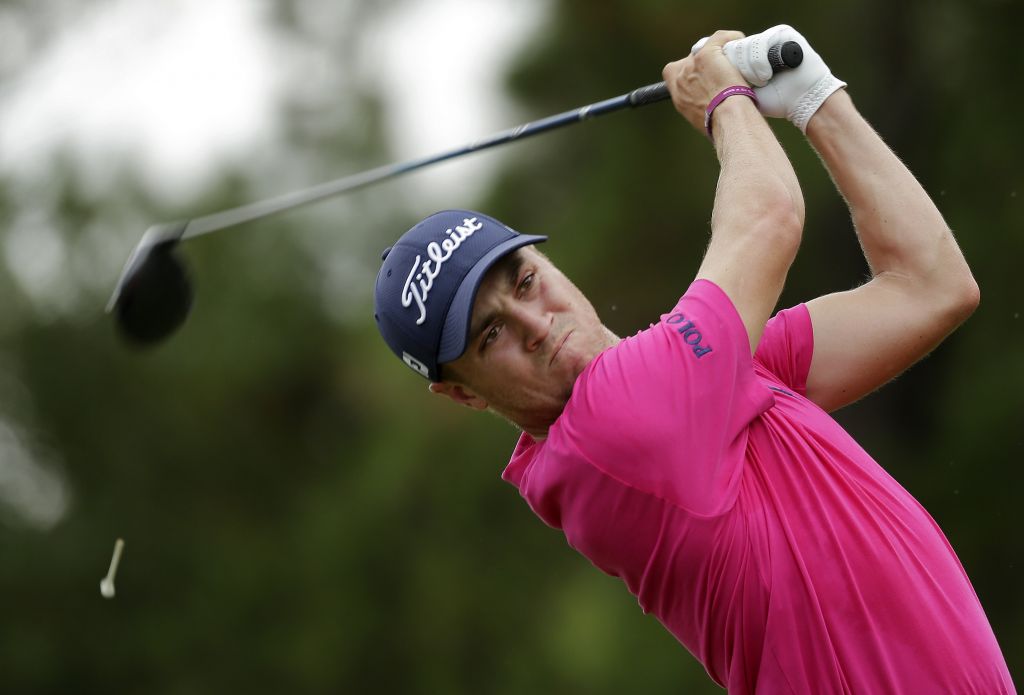 Justin Thomas watches his tee shot on the third hole during the final round of the PGA Championship golf tournament at the Quail Hollow Club Sunday Aug. 13 2017 in Charlotte N.C