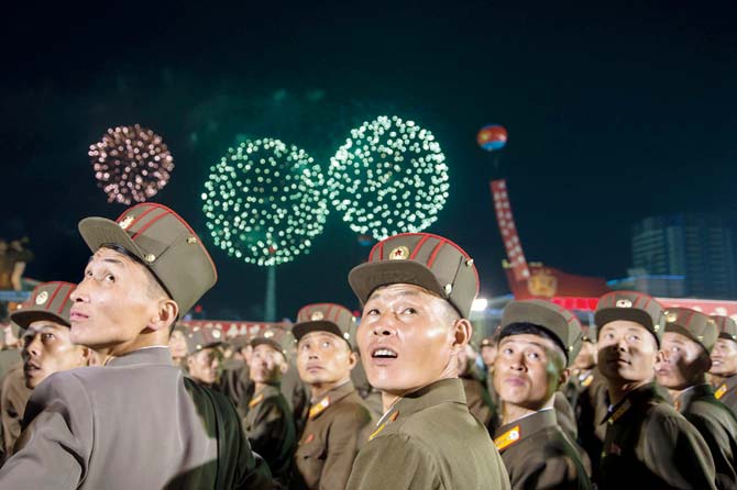 North Korean soldiers at a celebration for the latest n-test. Pic  AFP