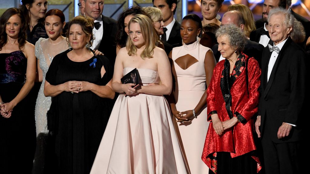 The cast and crew of The Handmaid's Tale — including Emmy winners Ann Dowd and Elisabeth Moss actress Samira Wiley and author Margaret Atwood — onstage during the 69th Primetime Emmy Awards