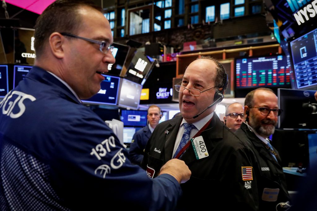 Traders work on the floor of the New York Stock Exchange on Wednesday