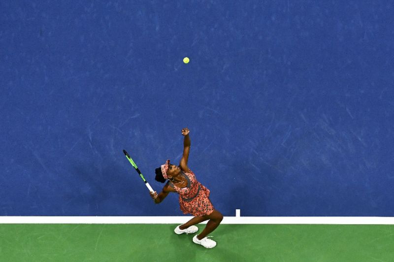 Venus Williams of the US serves to Czech Republic's Petra Kvitova during their 2017 US Open quarter-final match at the USTA Billie Jean King National Tennis Center in New York on September 5