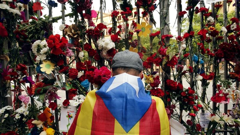 People placed flowers outside polling stations which had been sites of violent clashes during the vote