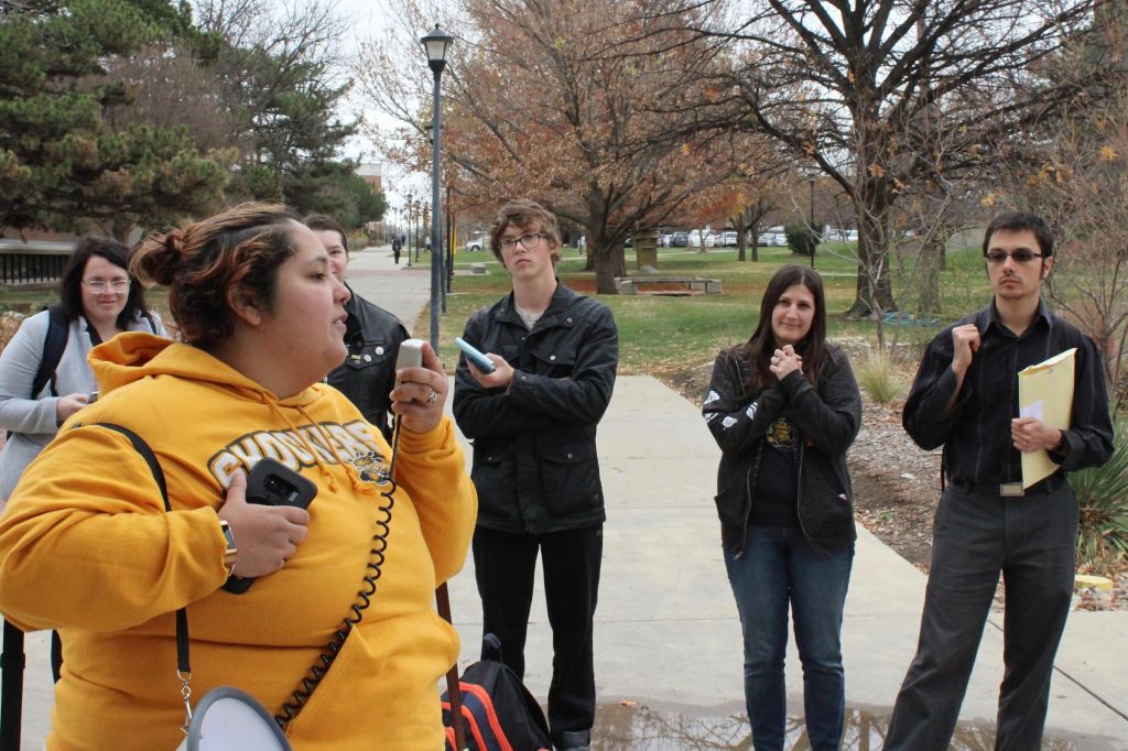 Deborah Ojeda-Leitner a graduate student at WSU speaks at a rally against the Republican tax reform efforts