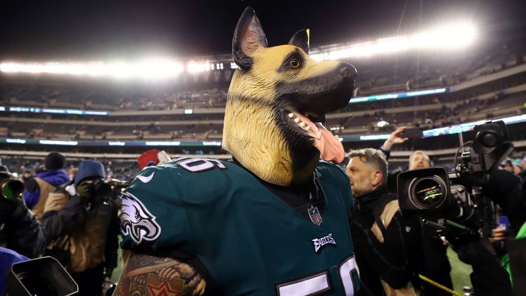 Chris Long wears a dog mask after the Eagles beat the Falcons