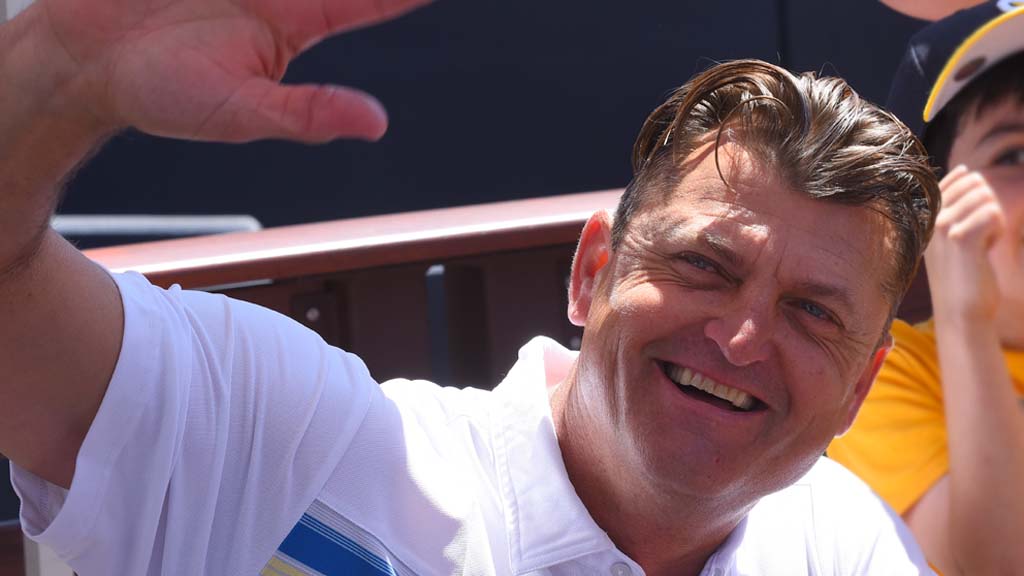 Former Padres relief pitcher Trevor Hoffman waves at fans