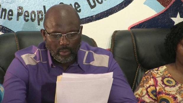 Former world footballer of the year George Weah has been sworn in as Liberia's president