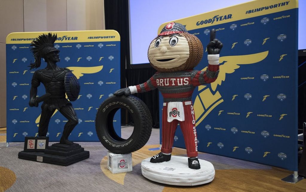 HOF Sponsor Goodyear Creates OSU  USC Mascots From Tires for Cotton Bowl